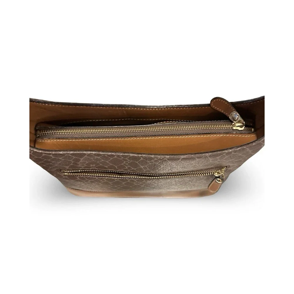 Nina Ricci 12x9x4 examine